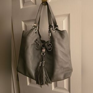 Michael Kors Leatger Bag With Tassels And Grommets